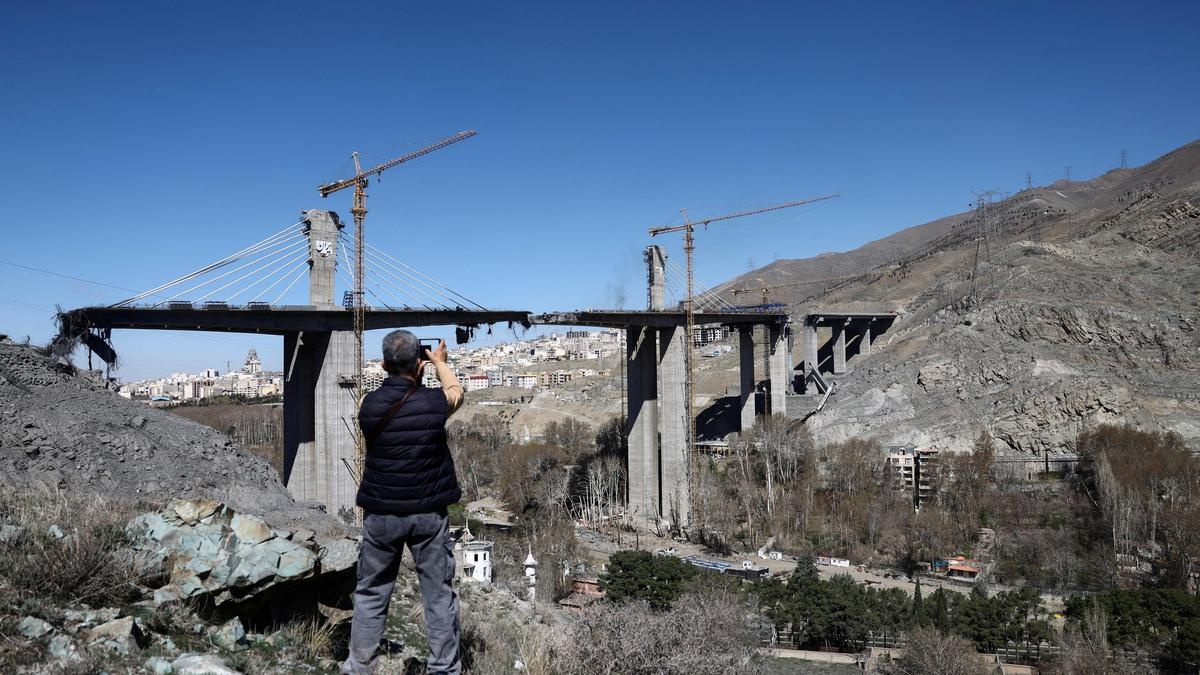 Iran turns bombed Karaj Bridge into a symbol of resistance 