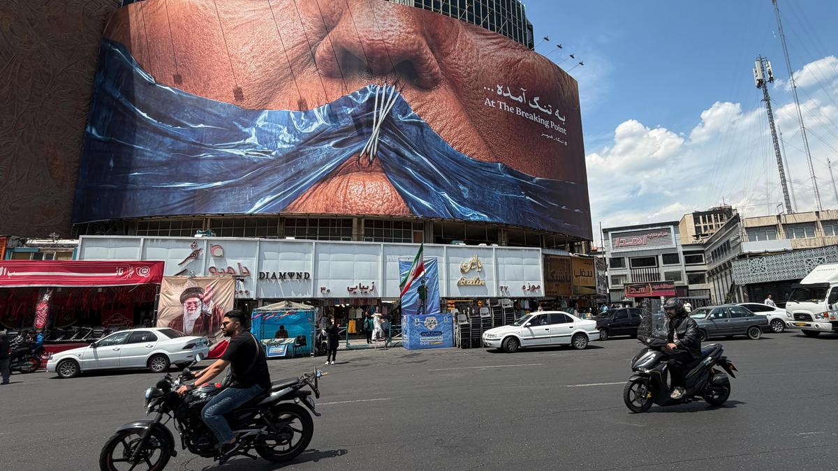 Sleepless in Tehran as crowds rally behind the flag 